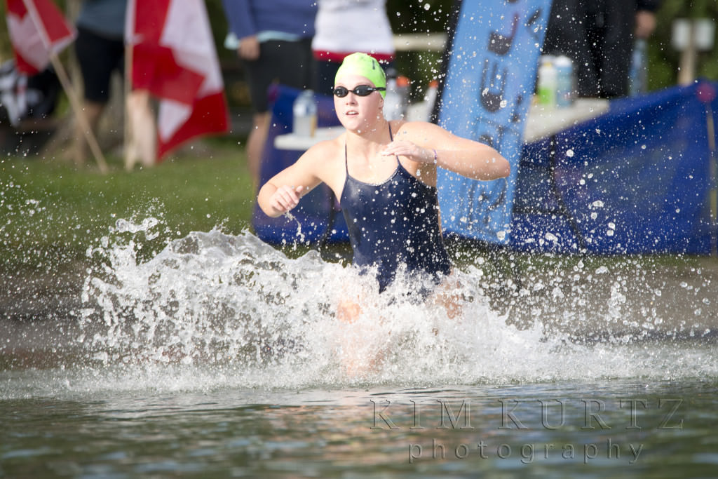 Haylie Burton getting back in the water after one of her loops of the 5Km swim at the Embrace Open Water SwimFest 2015